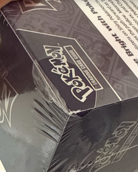 Pokemon TCG: Paldean Fates ETB (rip in plastic see picture)